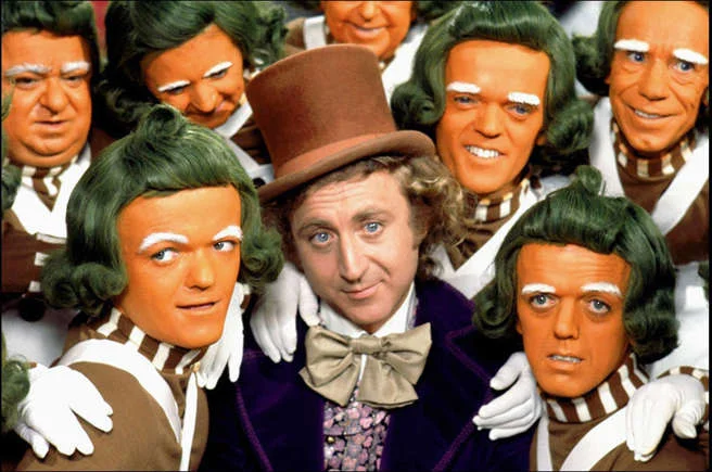 Willy Wonka and the little girl hit in the face