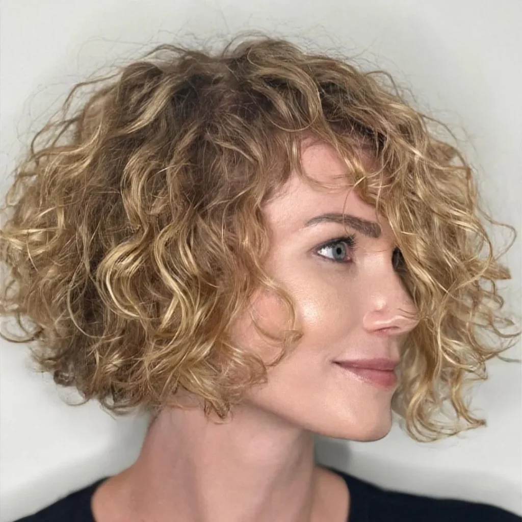 . Short Curly Bob with Side Bangs