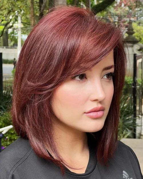 11. Burgundy Lob with Side Bangs
