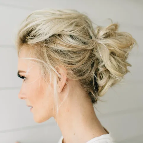 9. Messy Updo for Medium Cut