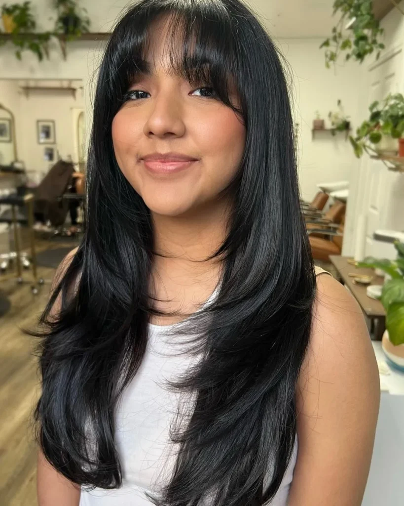 Long Layered Haircut with Wispy Bangs