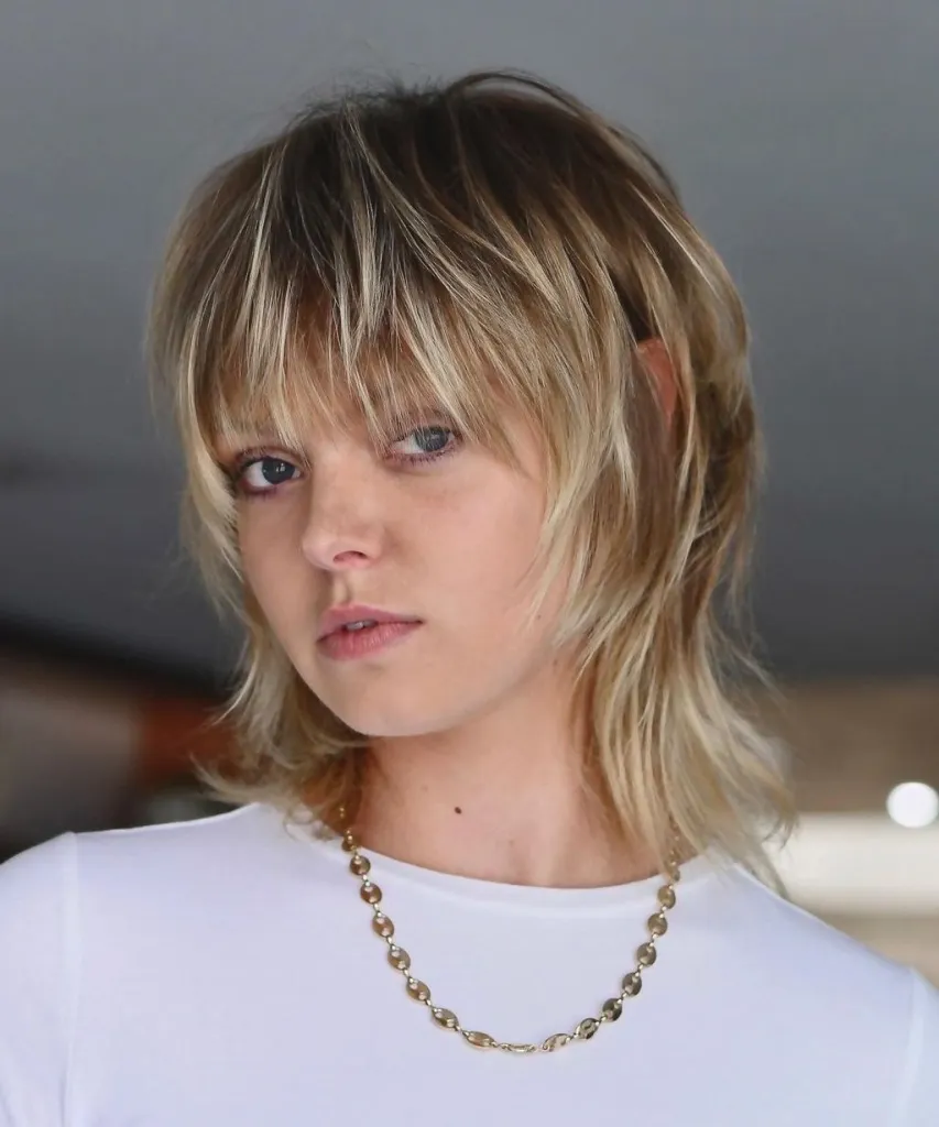 . Modern Short Mullet with Blonde Highlights