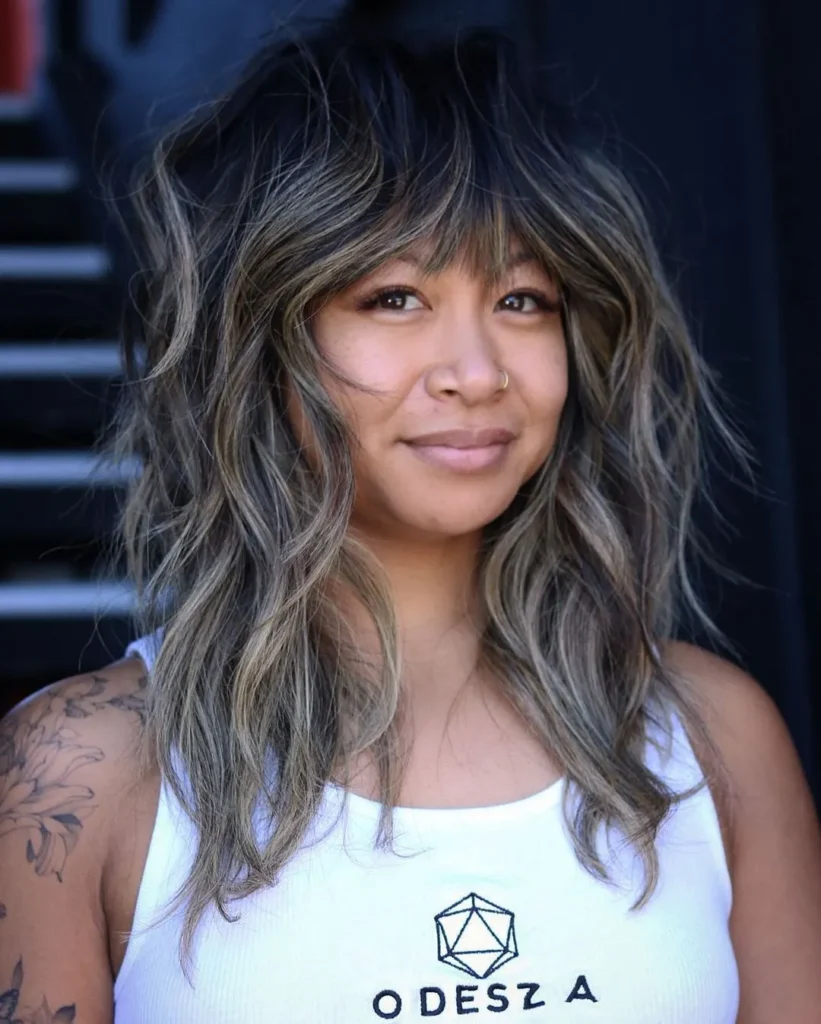 5. Messy Wavy Shag with Choppy Layers