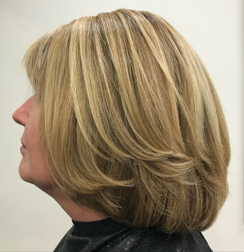 8. Two-Layer Bob Haircut with Bangs