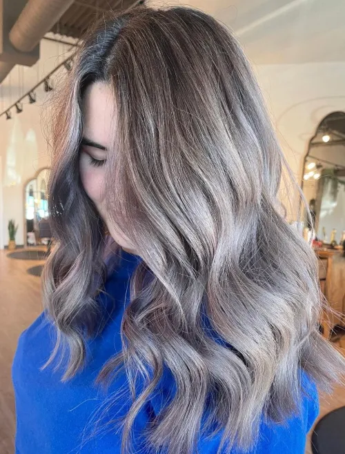 10. Icy Platinum Locks with Dark Roots
