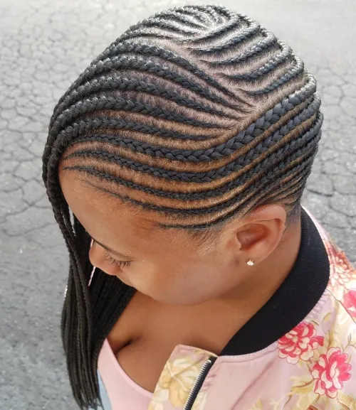 2. Dynamic Side-Swept Cornrows
