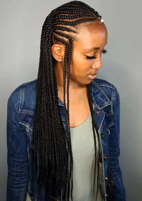 12. Simple Center-Part Fulani Braids with a Forehead Bead
