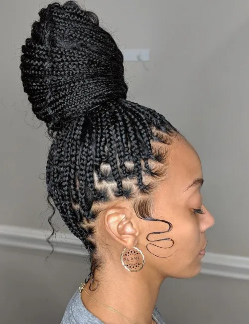 12. Small Box Braids into a Huge Bun
