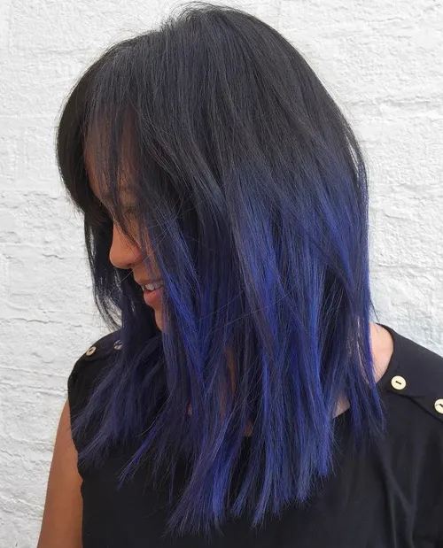 13. Choppy Lob with Blue and Dark Purple Highlights
