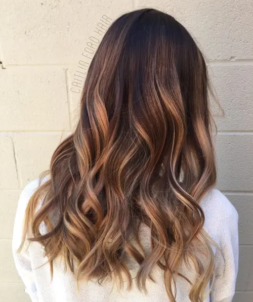 13. Wavy Chocolate and Ashen Balayage
