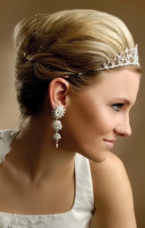 14. Back-Swept Blonde Hairstyle with a Tiara
