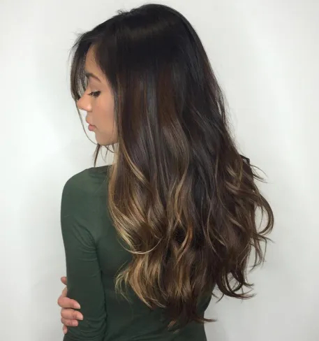 4. Long Brown Locks with Partial Highlights
