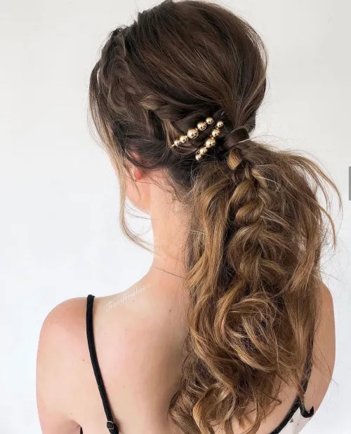 1. Loose Low Ponytail with a Messy Braid
