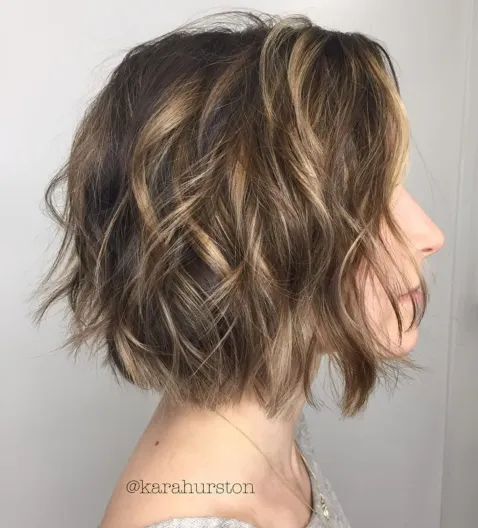 7. Messy Bob with Textured Waves and Babylights
