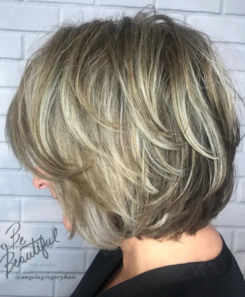 9. Metallic Bronde Bob with Feathered Layers
