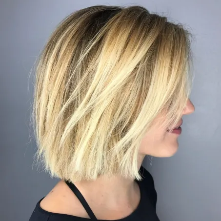 8. Shaggy Bronde Bob with Bright Highlights
