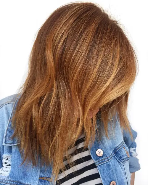 6. Tonal Strawberry Blonde Balayage
