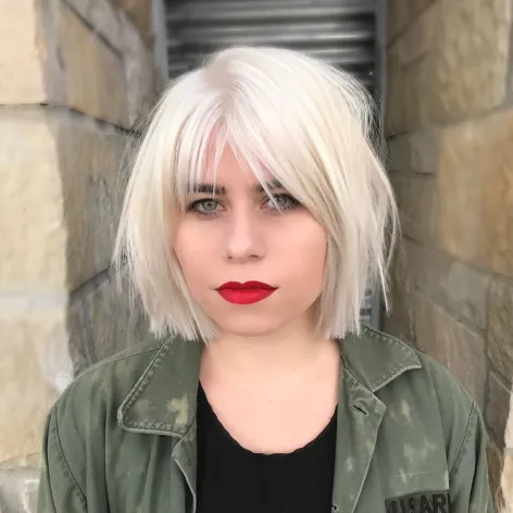 11. Blunt and Choppy White Blonde Bob
