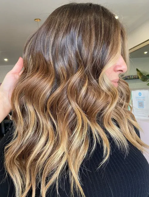 7. Blonde Balayage in Warm Tones
