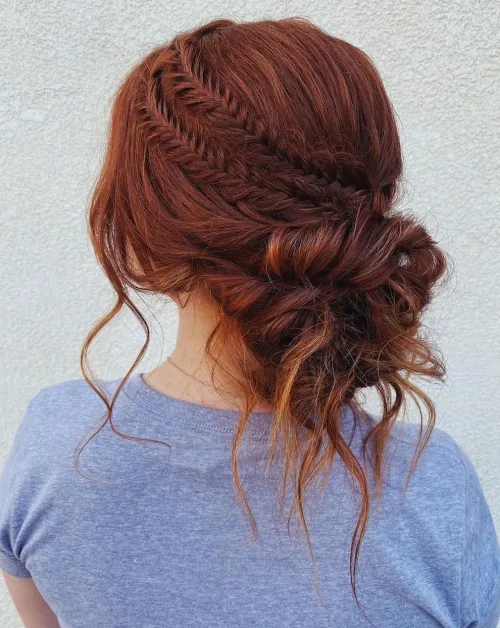 7. Messy Bun with Two Fishtail Braids
