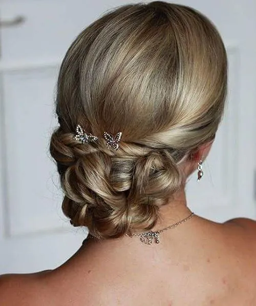 6. Twisted and Curled Low Chignon
