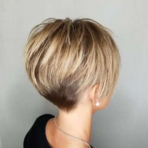 1. Pixie with Long Crisp Layers and Nape Undercut
