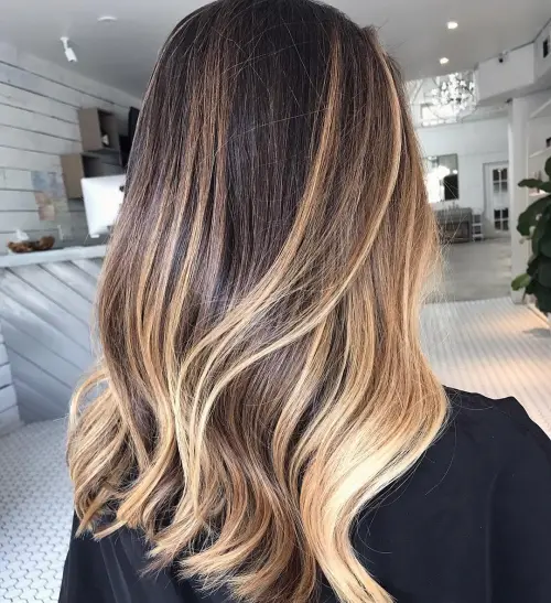 9. Cool-Toned Brown and Blonde Balayage
